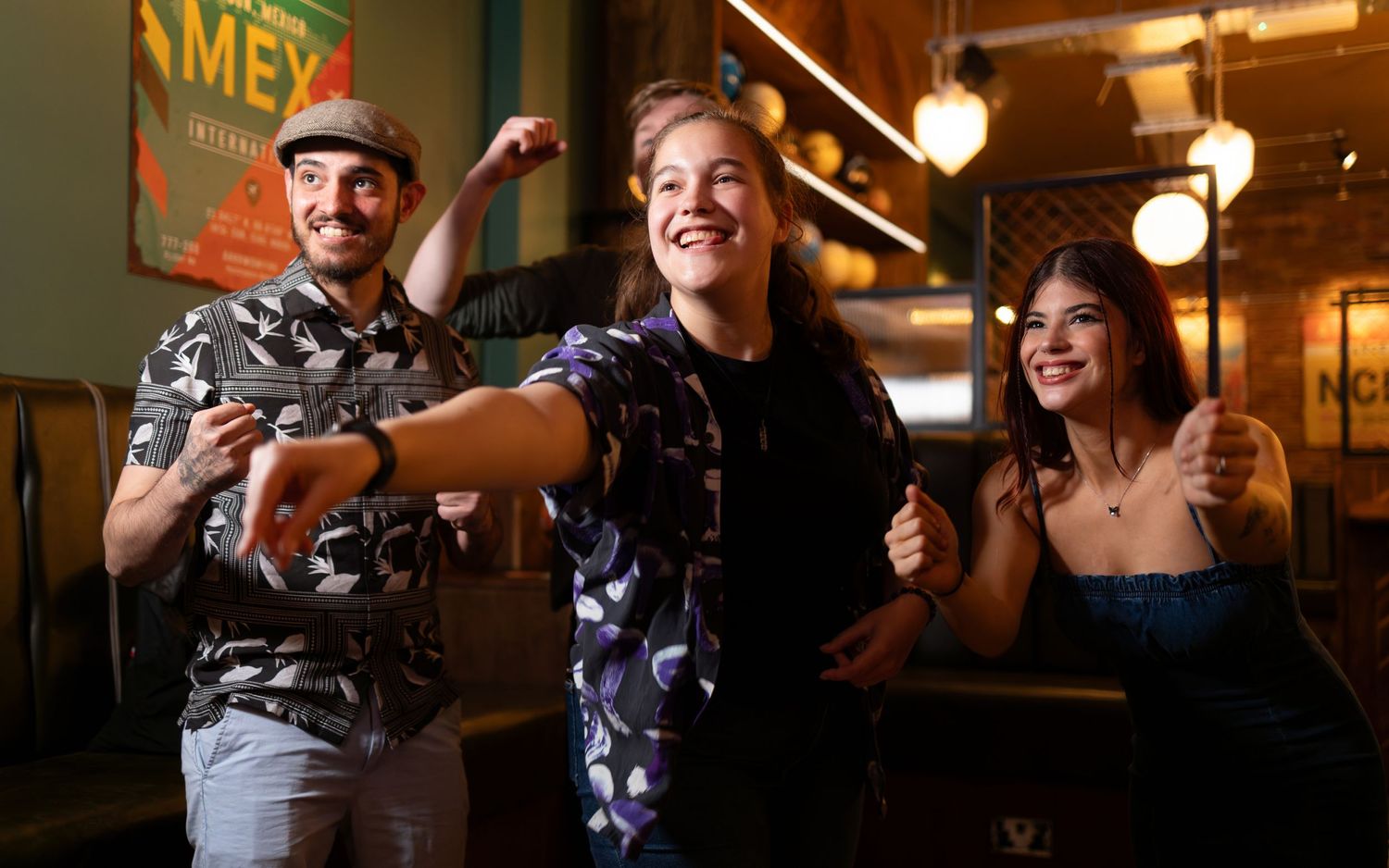 Friends celebrating with party hats at Arrowsmiths bar Southampton, lifestyle photography by Ryan Stanikk