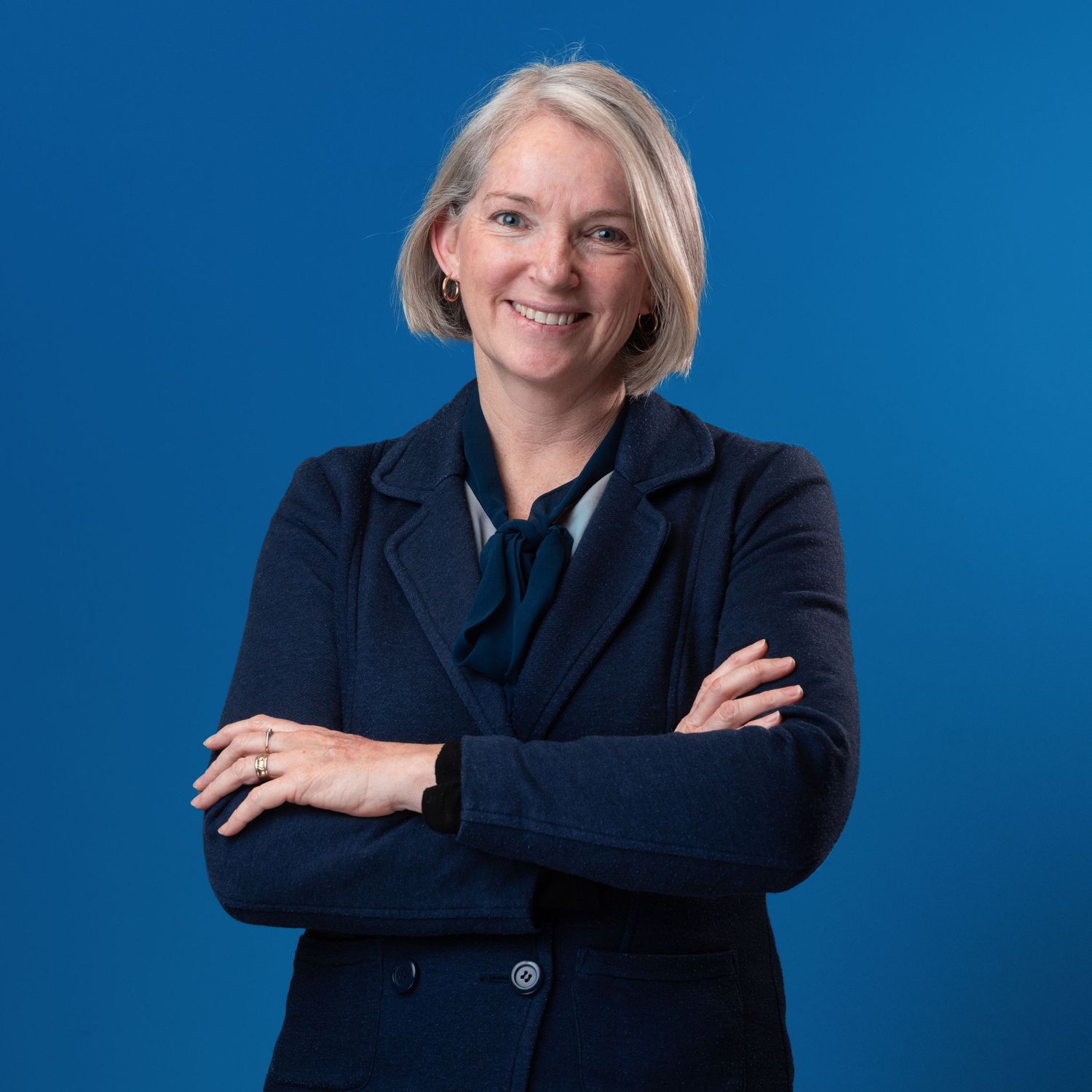 Professional corporate headshot with clean background, headshot photography by Ryan Stanikk