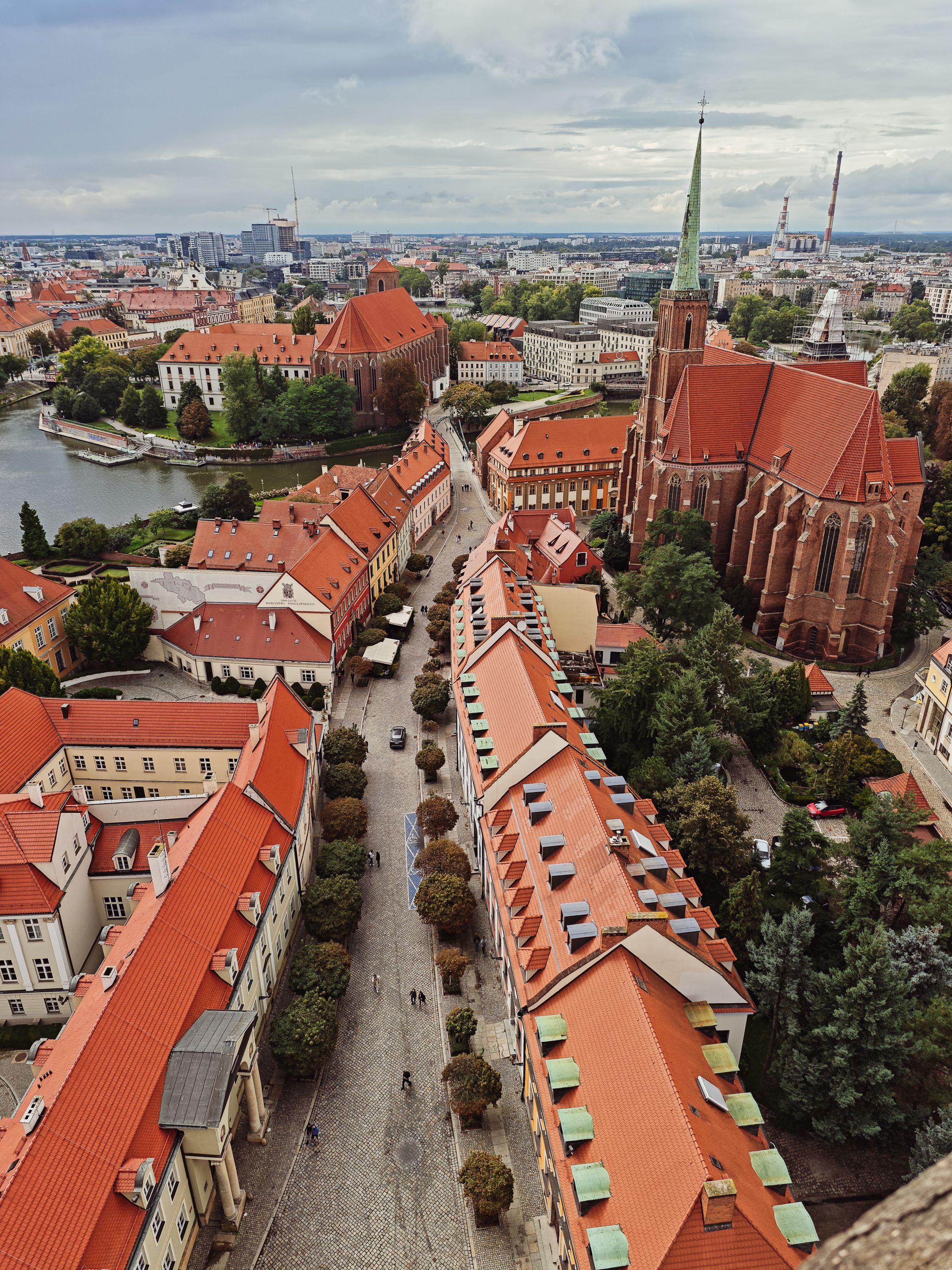 Rynek Market Square historic town hall with colourful renaissance buildings and crowds of tourists, cityscape photography Wroclaw Poland