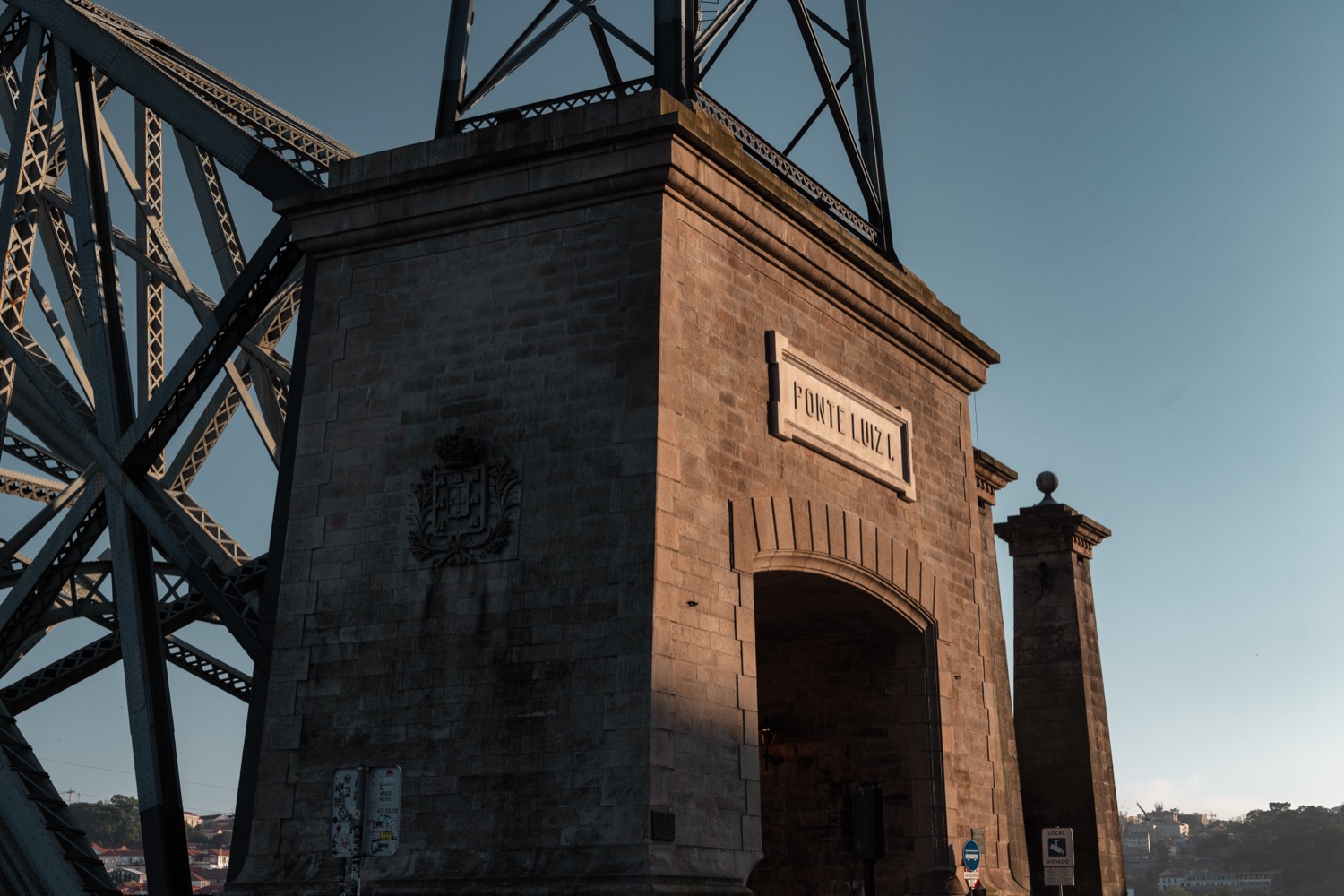 The stone pillar and ironwork of the Dom Luis I bridge from below, Porto, Portugal, travel photography