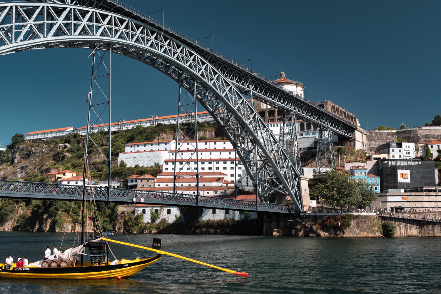 A rabelo boat on the Douro below the Dom Luis I bridge, Porto, Portugal, travel photography